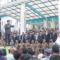 Abu Rizal saat menyampaikan orasi mendesak Pemkab dan DPRD PALI segera mengaktifkan 40.499 BPJS warga di Halaman Gedung DPRD PALI, Senin (19/01/2026)
(edok/Abu Rizal)
