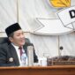 Bupati PALI menyampaikan Nota Pengantar Laporan Keterangan Pertanggungjawaban (LKPJ) Tahun Anggaran 2025 dalam Sidang Paripurna DPRD PALI, Senin (30/3/2026). Dalam laporannya, realisasi belanja daerah mencapai Rp1,44 Triliun atau 89,49% dari target yang ditetapkan. Sektor Belanja Transfer menjadi yang paling efektif dengan capaian 98,50%. (Foto: Dok/Kominfostaper)