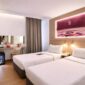 Suasana kamar modern di fave+ Hotel Palembang yang menjadi bagian dari paket eksklusif 