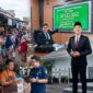 Melalui sentuhan tangan Kaban Bapenda PALI Aryansyah, sektor pajak daerah di Kabupaten Penukal Abab Lematang Ilir (PALI), Sumatera Selatan melejit melebihi target bulanan pada tahun 2026. Laporan tintamerah.co mencatat lonjakan tajam pada Pajak Restoran sebesar 83,14% dan BPHTB mencapai 378,43% per Mei 2026. Ilustrasi AI ini menggambarkan bagaimana efektivitas ruang kontrol digital dan pendekatan digitalisasi UMKM di Pasar PALI menjadi kunci keberhasilan Kaban Bapenda Aryansyah (tengah) dalam menerjemahkan Visi Hebat Bupati Asgianto (kanan) di era baru kepemimpinan. (Foto ilustrasi AI: Dok/tintamerah.co)
